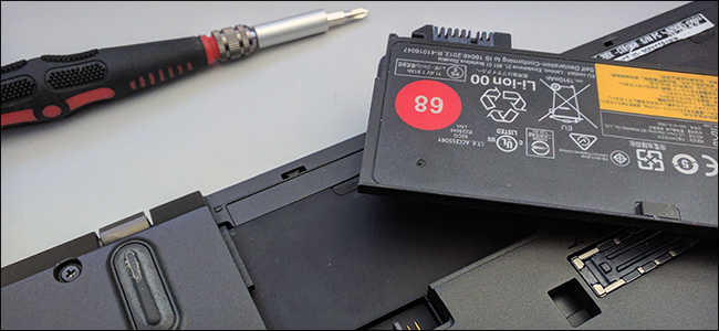 Изображение батареи ноутбука и предупреждающий знак