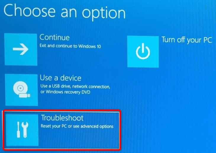 Нажмите кнопку Поиск и устранение неполадок в меню Дополнительного запуска