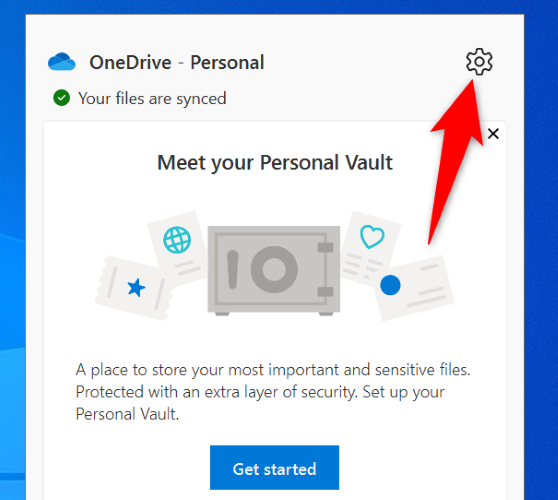 Кнопка шестерёнки в правой верхней части панели OneDrive