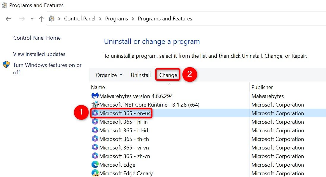Выбран Microsoft Office и выделена кнопка 'Change' в списке программ