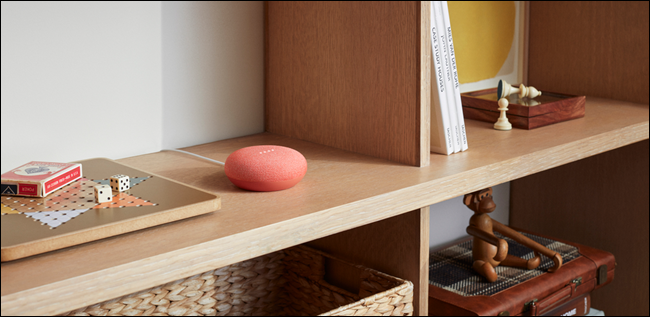 Red Google Home on a shelf.