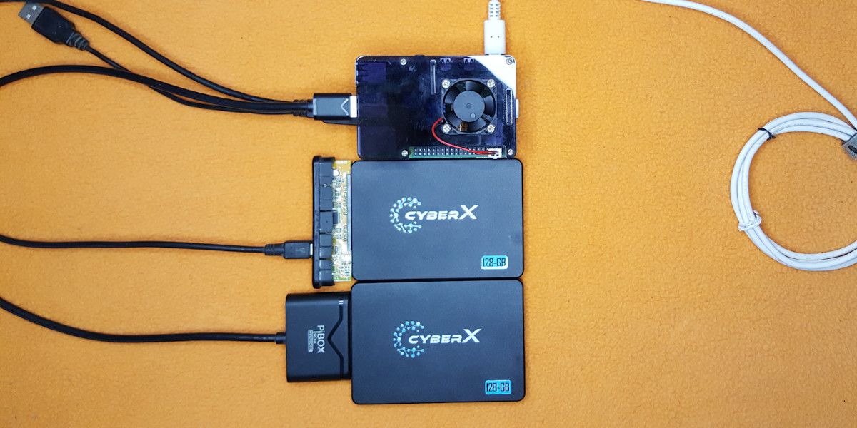 Two SSDs conncected to a Raspberry Pi 4 using USB to SATA Adapters