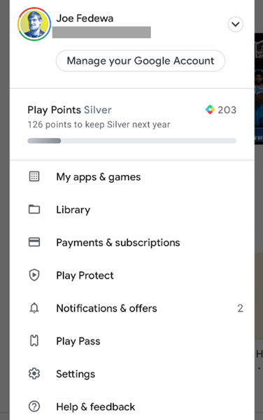 Раскрытое меню Google Play с пунктами 'Мои приложения и игры', 'Библиотека' и настройками