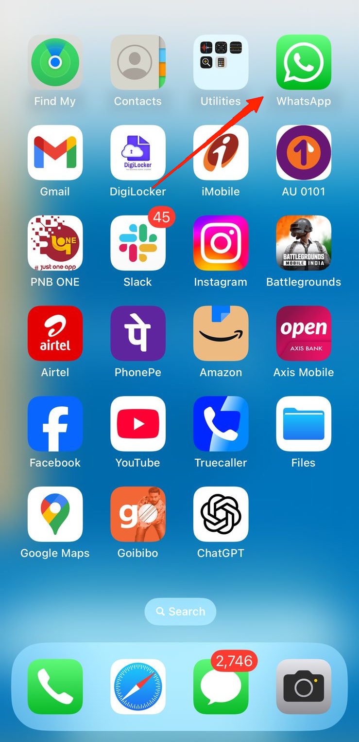 Launch WhatsApp, open a chat and tap the emoji icon.