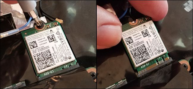 Модуль Wi‑Fi извлечён из разъёма, видны контакты и крепёжный винт