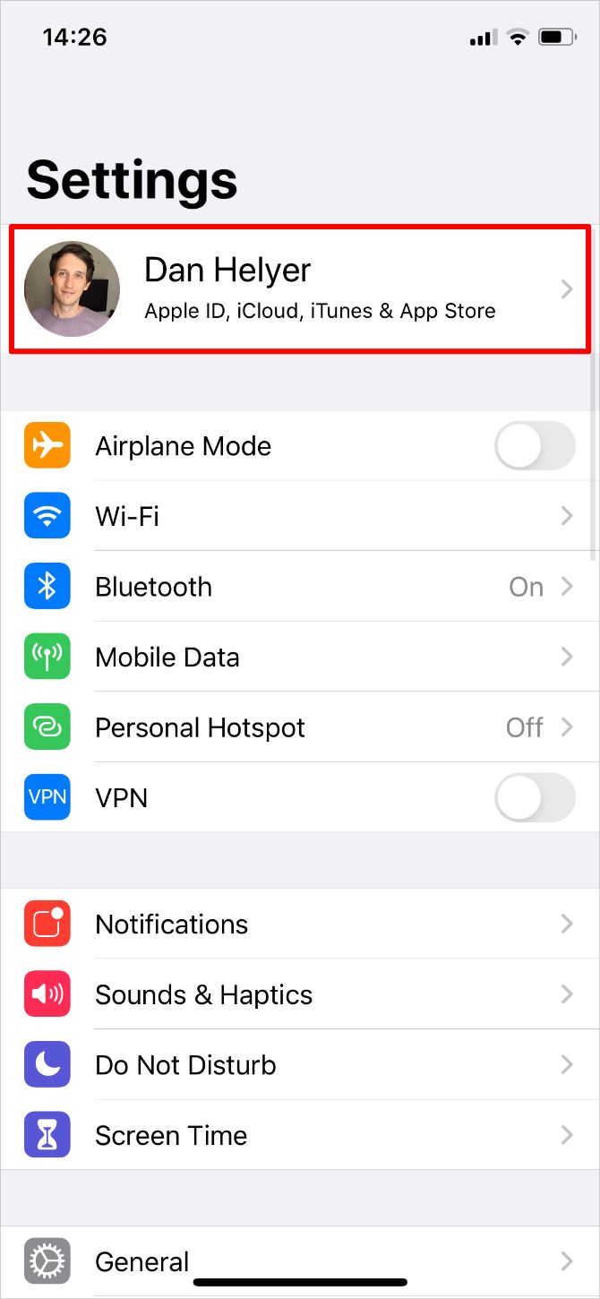 iPhone Settings highlighting Apple ID option