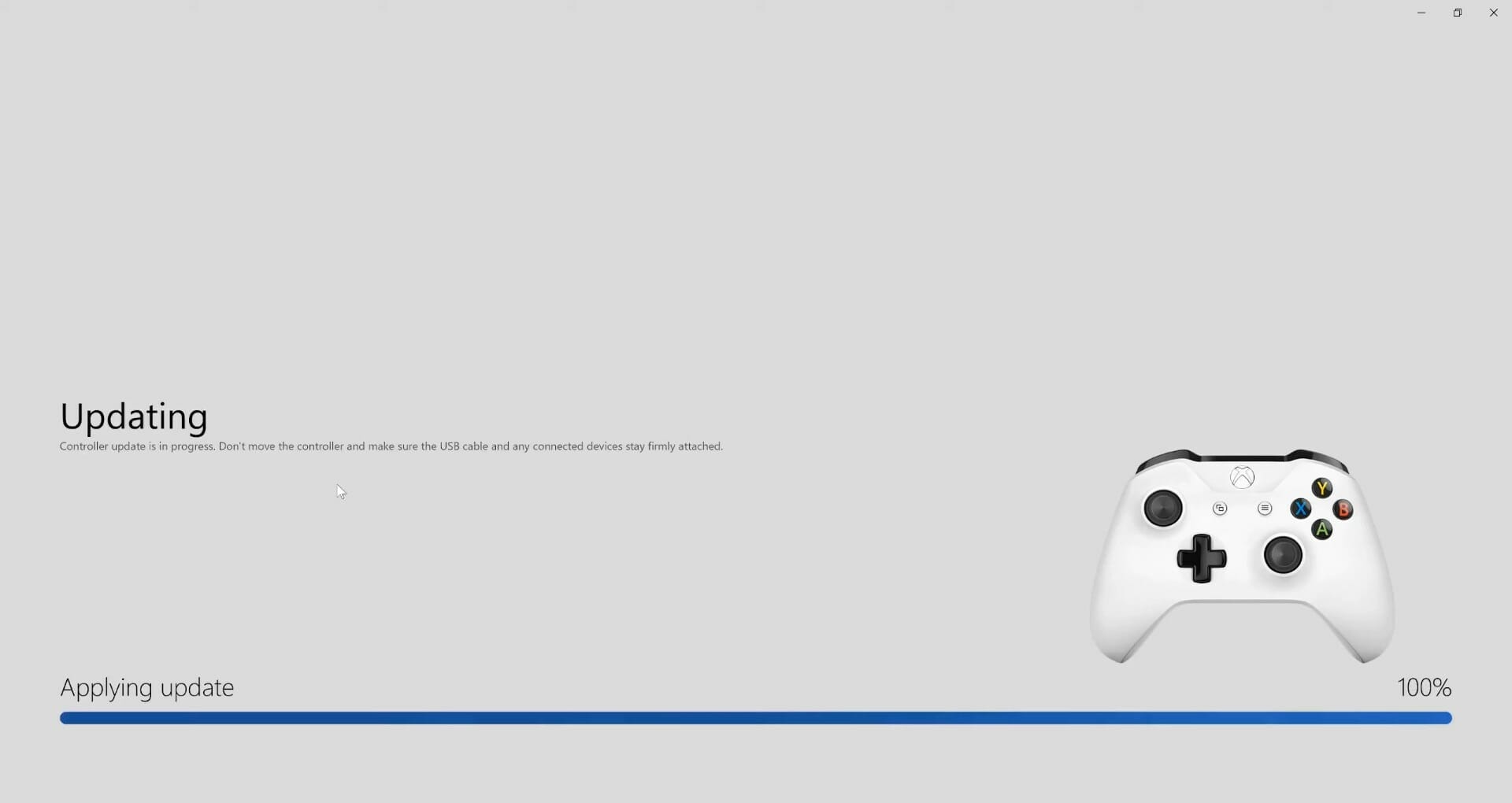 Прогресс обновления прошивки в приложении Xbox Accessories