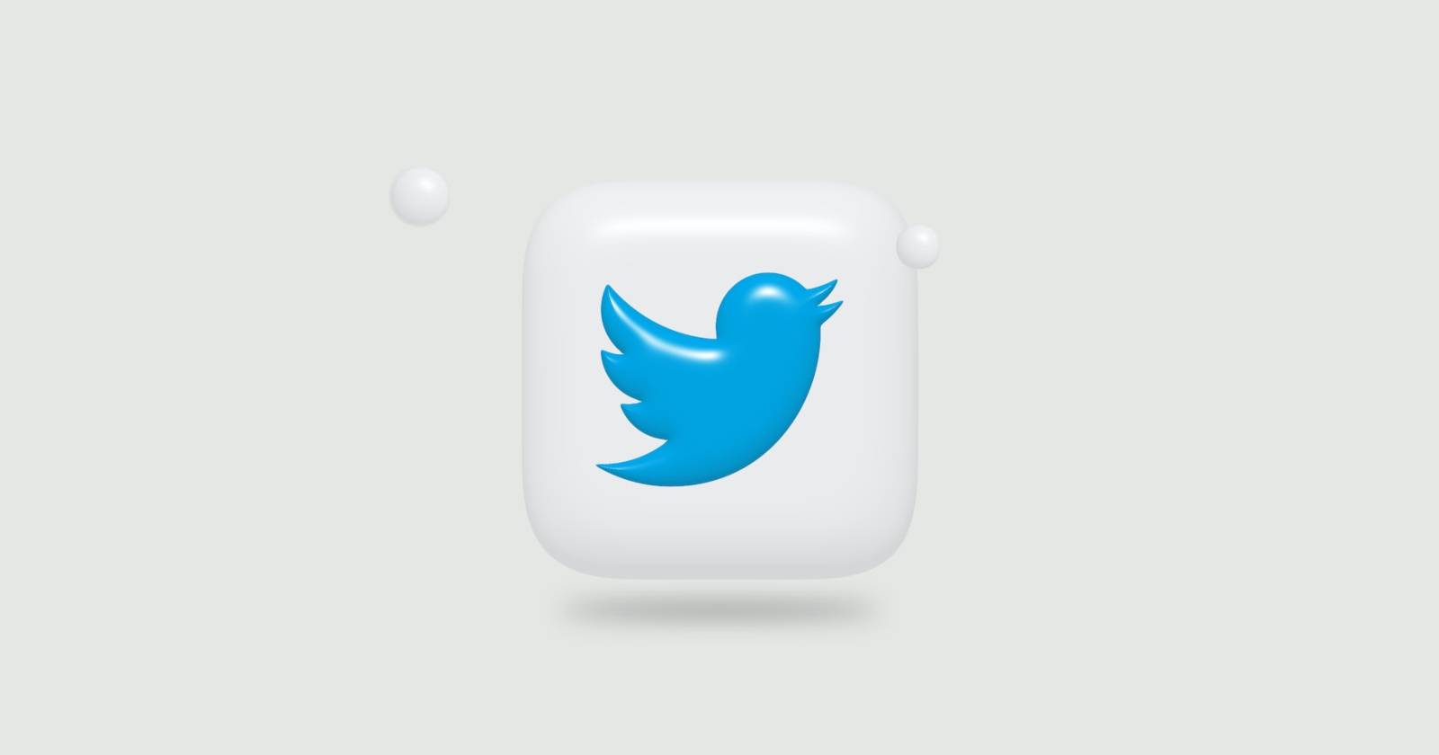Плавающий логотип Twitter на синем фоне