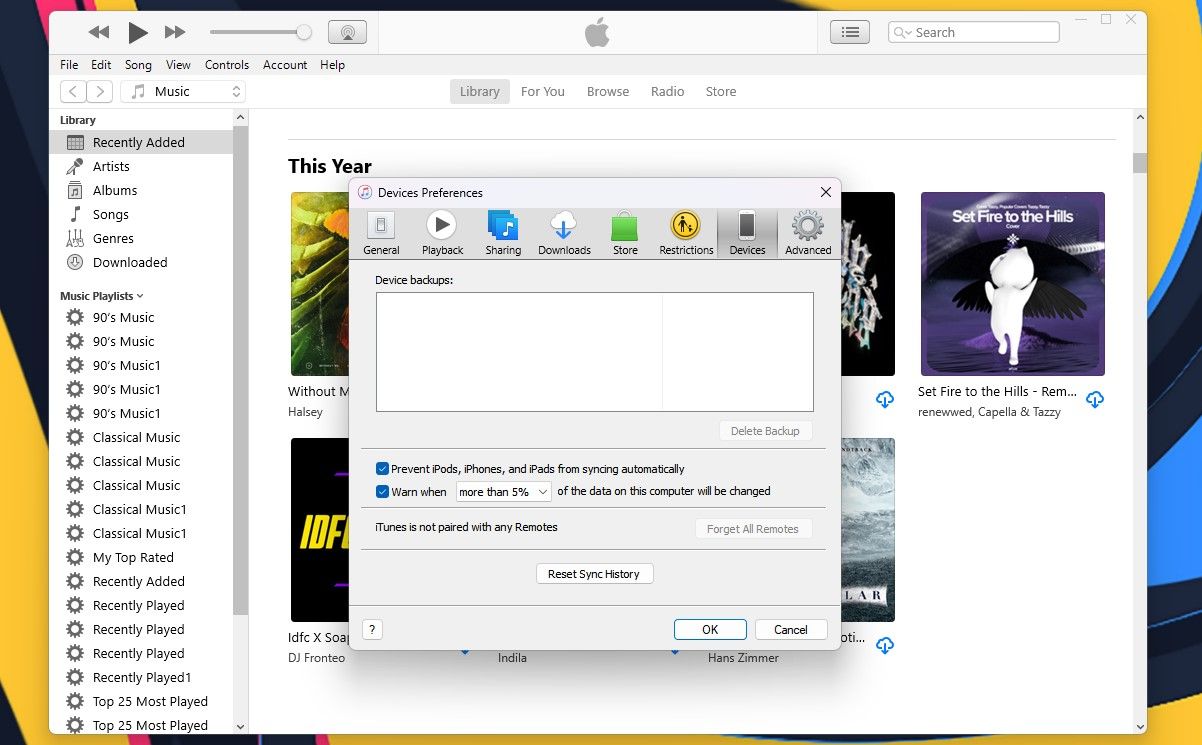 Окно настроек устройств iTunes в Windows с отмеченной опцией запрета автосинхронизации