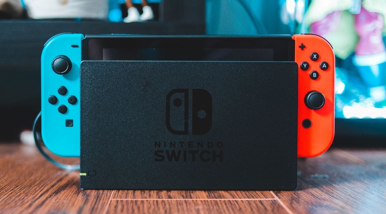 A photograph of a docked Nintendo Switch console