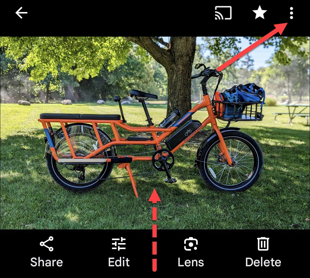 Проведите вверх по фото или нажмите значок меню с тремя точками.
