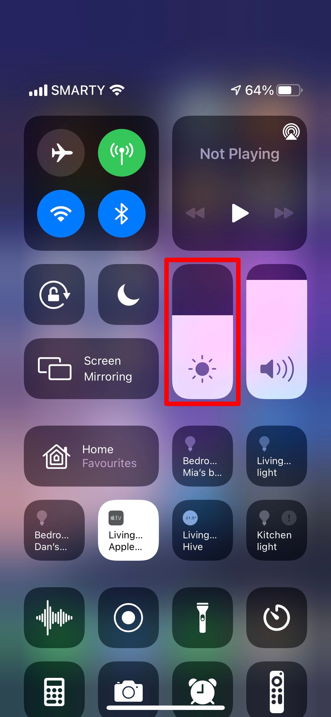 iPhone Control Center highlighting the Brightness slider