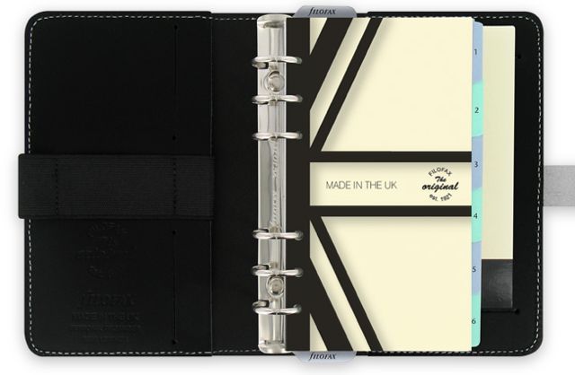 Открытый Filofax с прокалываемыми страницами и разделителями