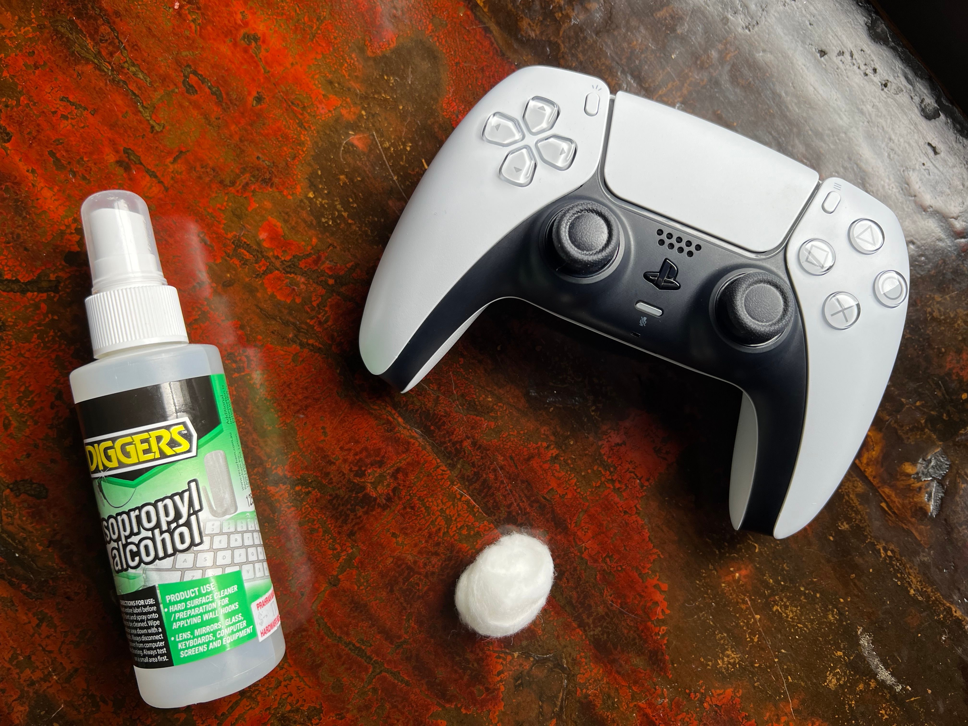 Things you'll need to clean a DualSense controller analog stick.
