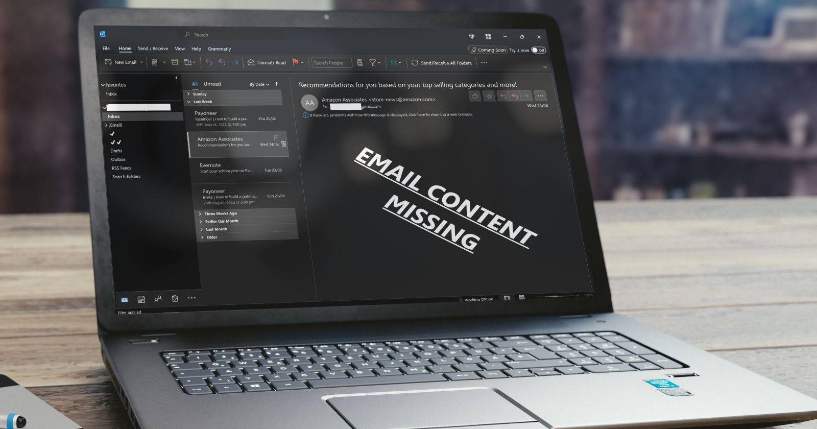 Макет ноутбука с открытым Outlook, в котором тело письма отсутствует