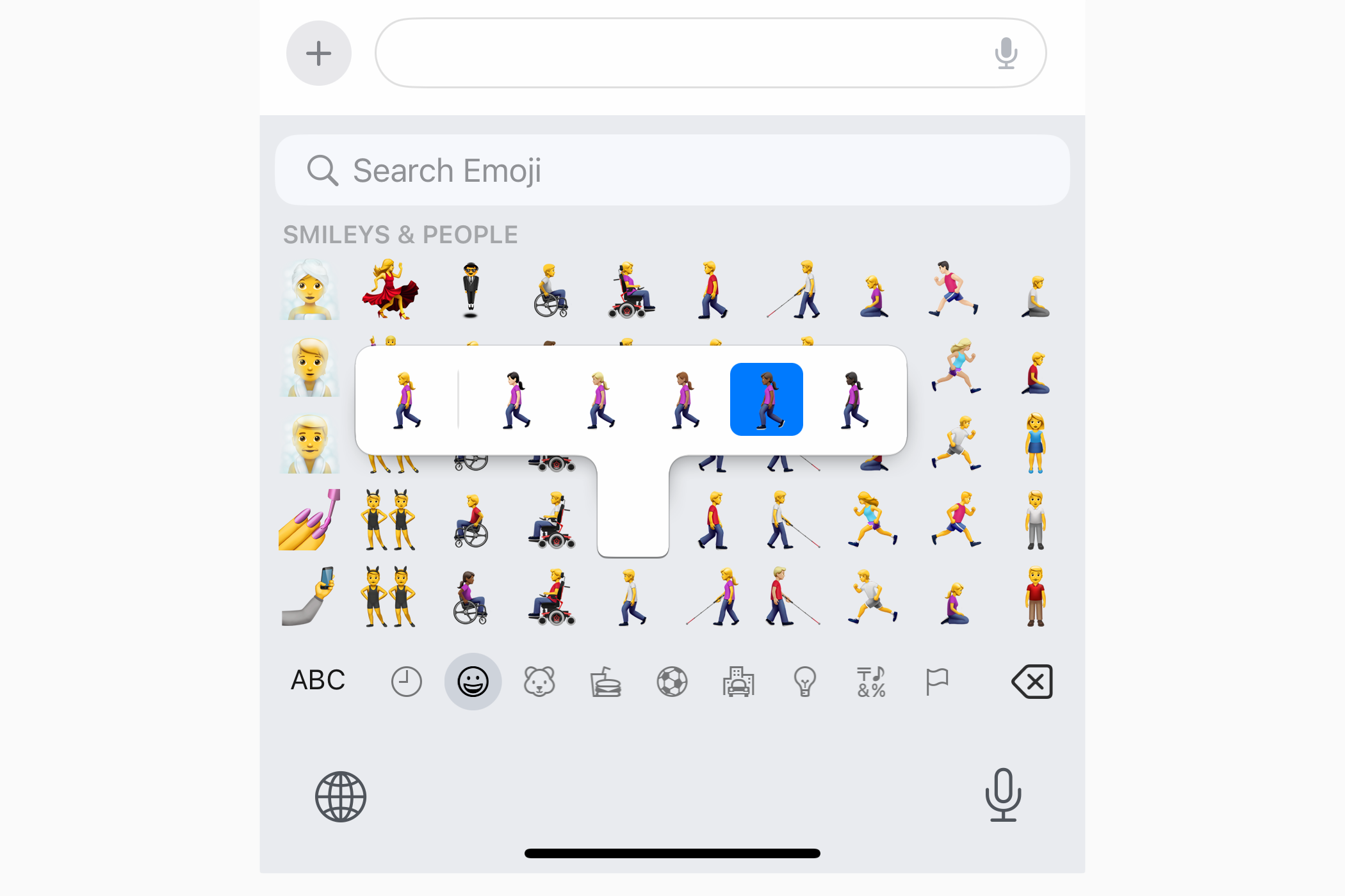 Выбор оттенка кожи для эмодзи на iPhone.