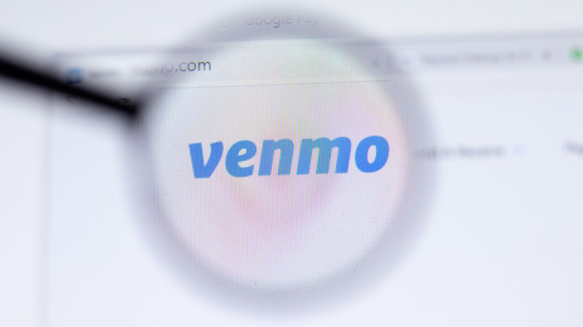 Логотип Venmo под увеличительным стеклом