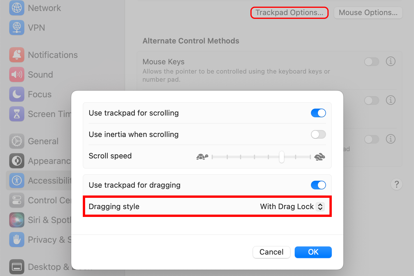 Окно Системных настроек macOS с включённым блокировкой перетаскивания