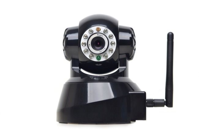 Câmera IP sem fio, vista lateral sobre fundo branco