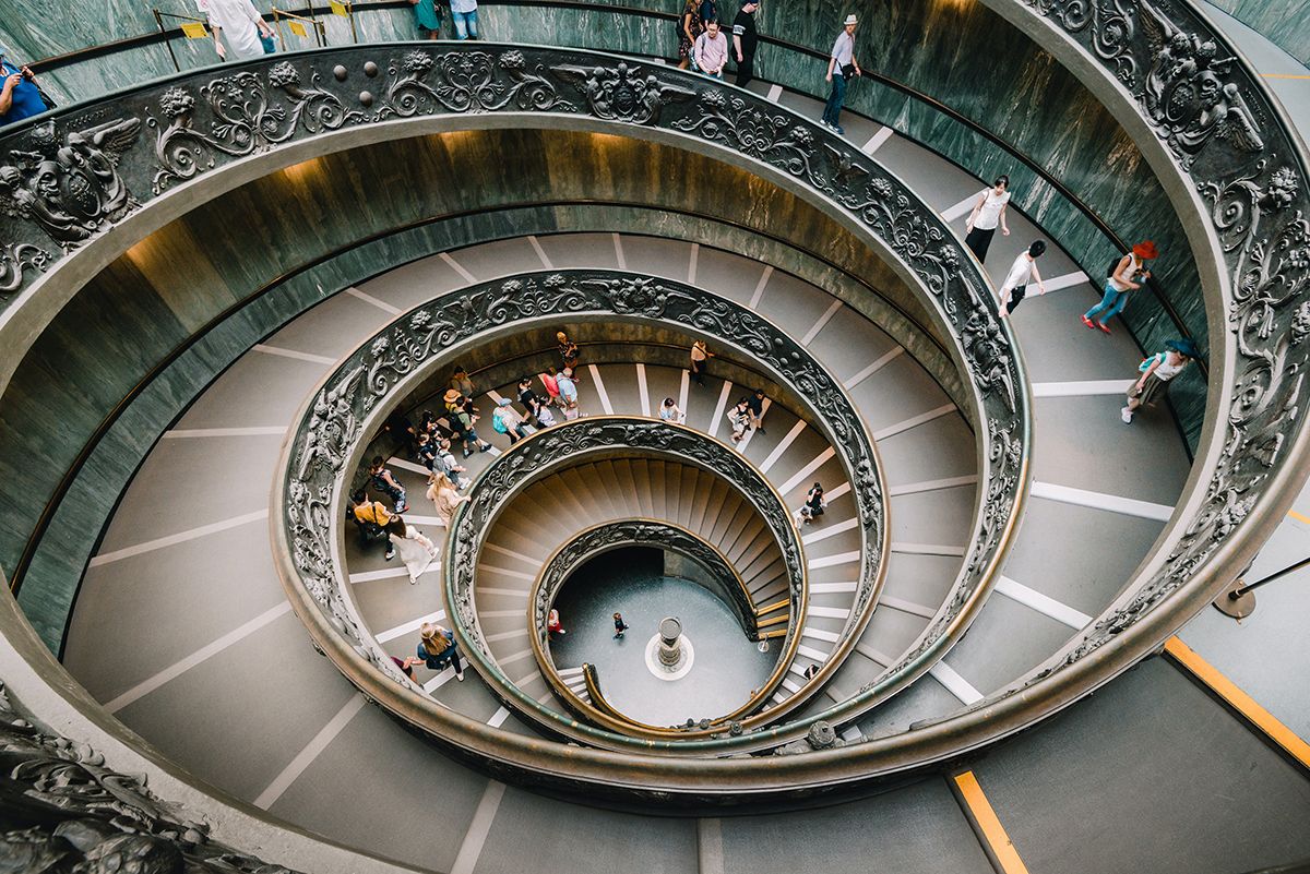 View from the top of a large spiral staircase.