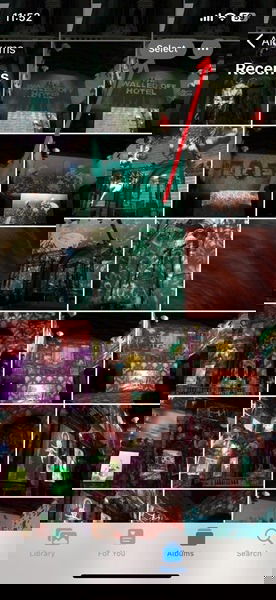 Нажатие кнопки Выбрать для выбора изображений в приложении Фото на iPhone.