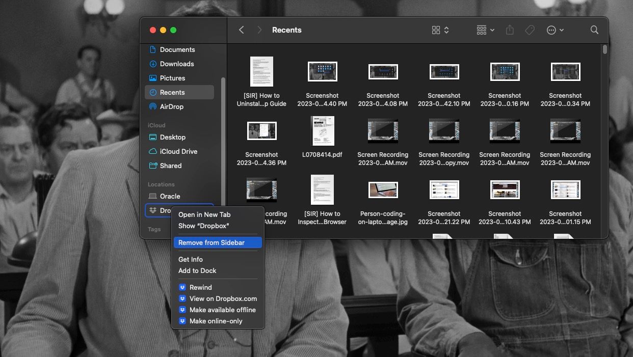 Опция Удалить из боковой панели выбрана для Dropbox в боковой панели Finder