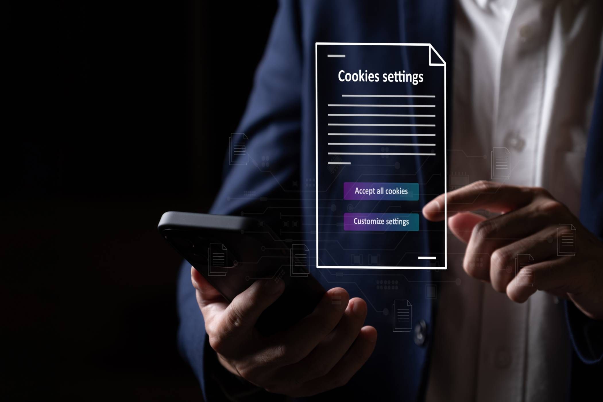 Рука с телефоном и всплывающее окно с вариантом принять cookie