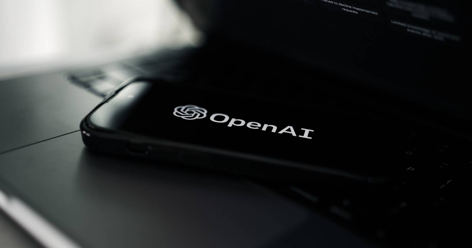 OpenAI Logo on Phone Screen