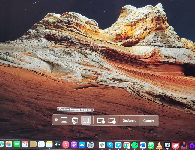 Курсор в виде камеры при выборе окна для скриншота в macOS
