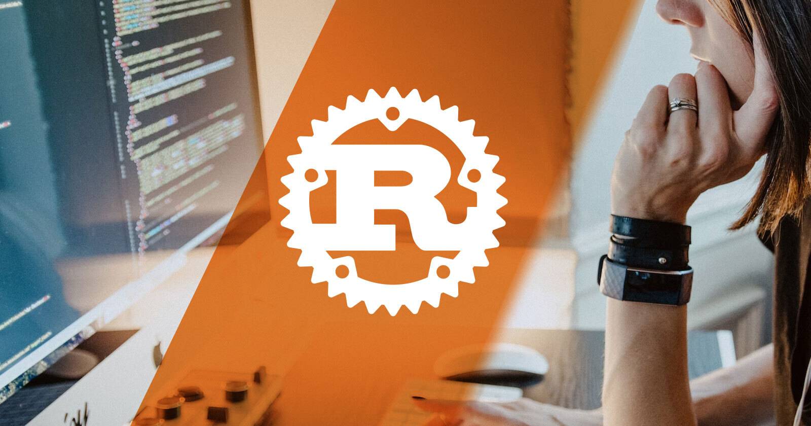 Логотип Rust наложен на фотографию человека, работающего за iMac