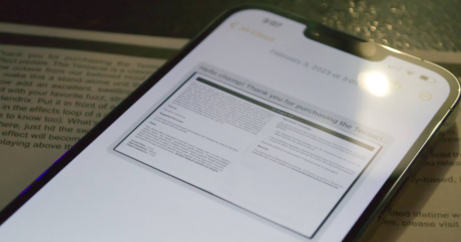 Экран с отсканированным документом на iPhone