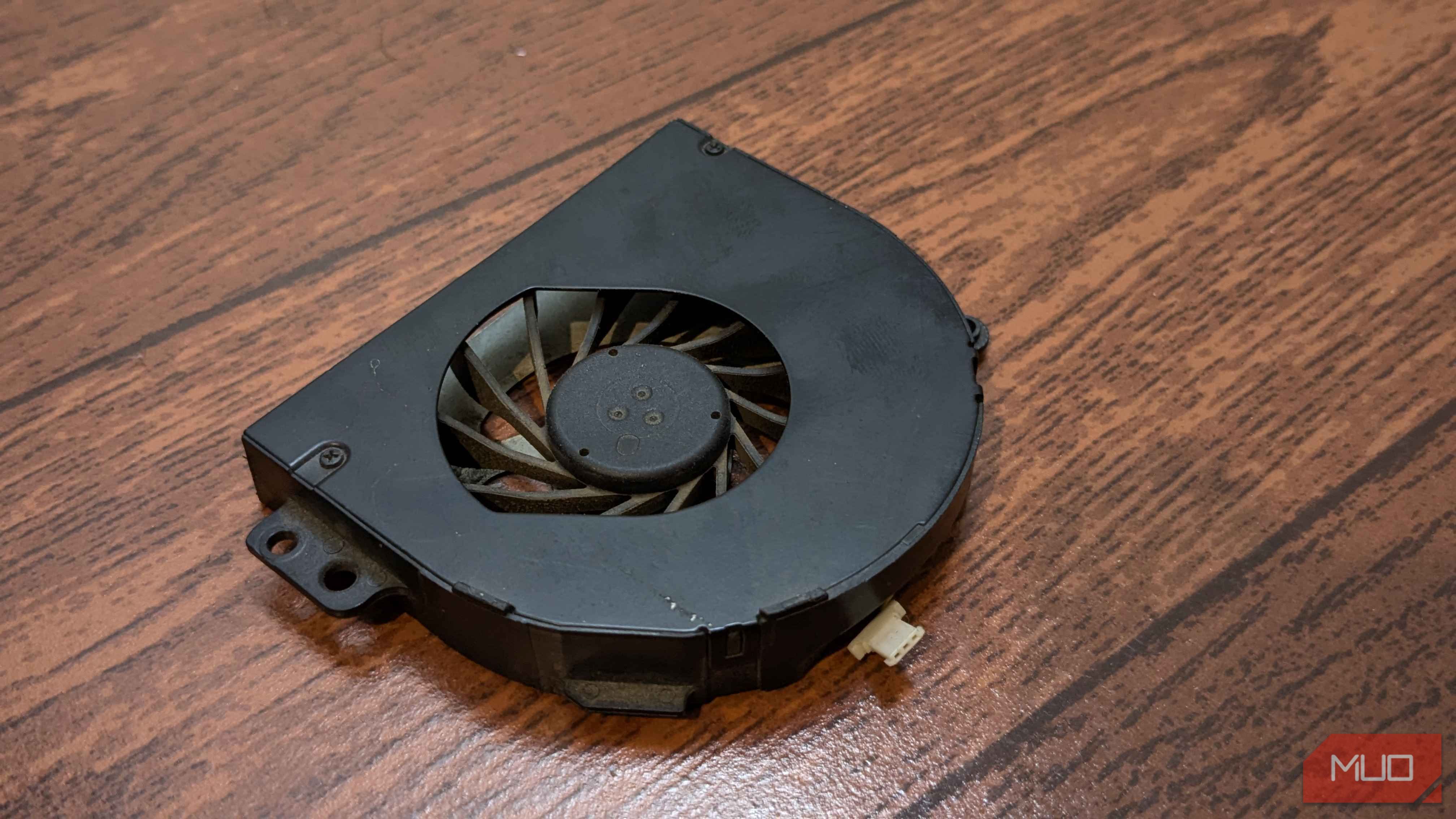 Laptop fan lying flat on a table
