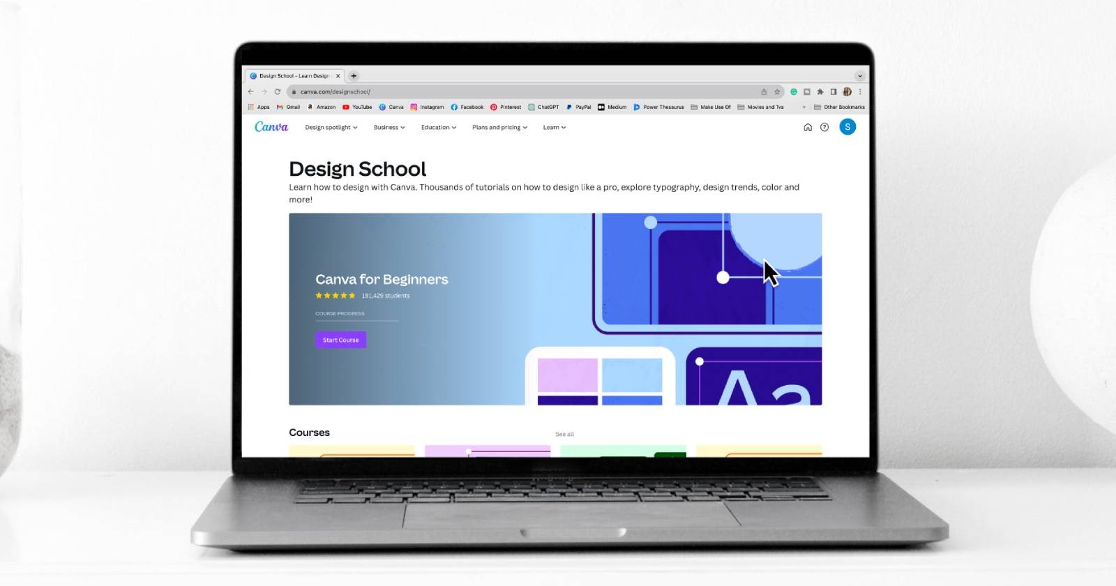 Интерфейс сайта Canva Design School на ноутбуке