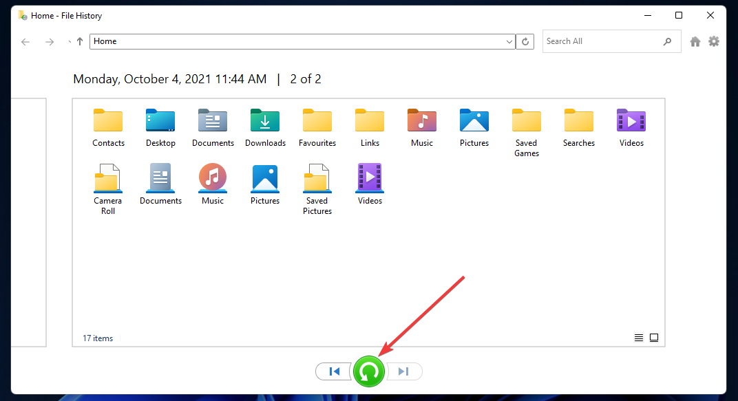 Выбор версий файлов и кнопка восстановления в Истории файлов