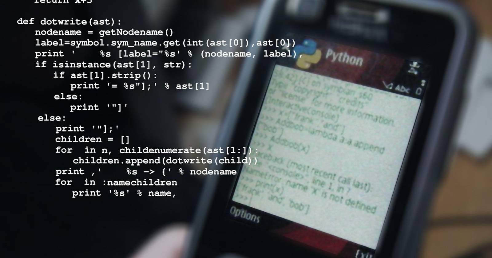 Скриншот кода Python поверх изображения мобильного телефона