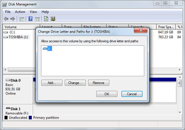 Скриншот: управление дисками в Windows для скрытия тома