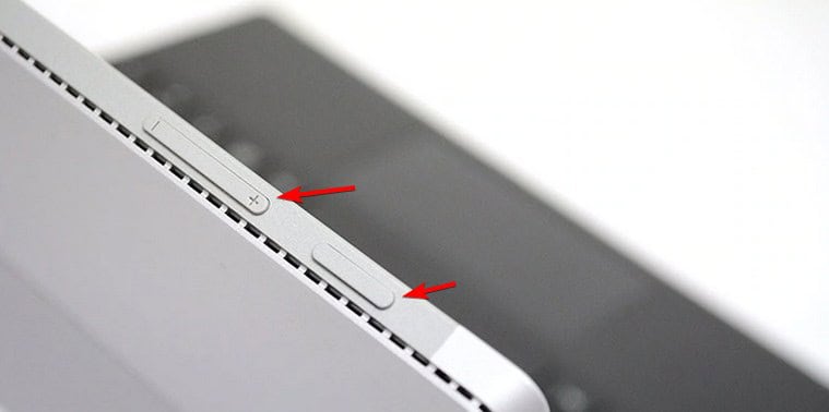 Удерживайте кнопку увеличения громкости и затем питание