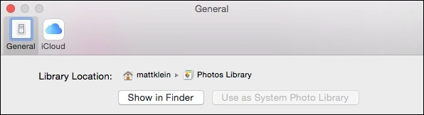 Диалог открытия библиотеки в Photos после перемещения