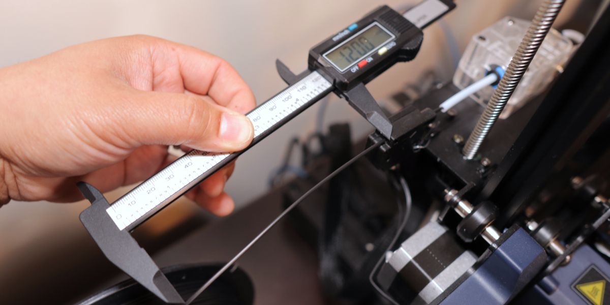 Measuring 120mm of filament from the runout sensor