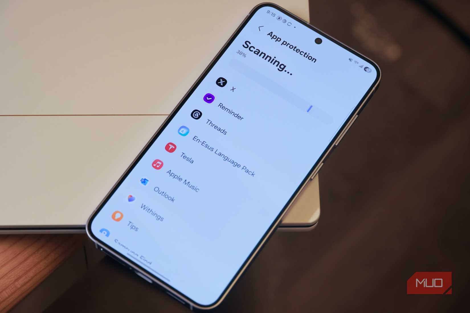 Scanning apps on a Samsung Galaxy phone with app protection.