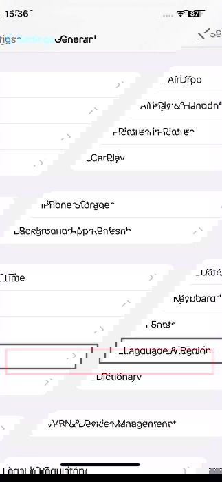 Переход в раздел Язык и регион в настройках iPhone