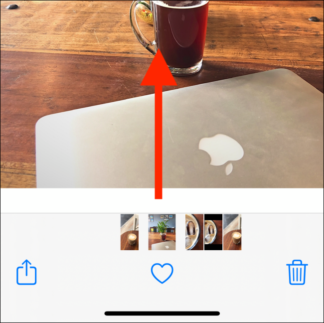 Смахнуть вверх на изображении в Photos
