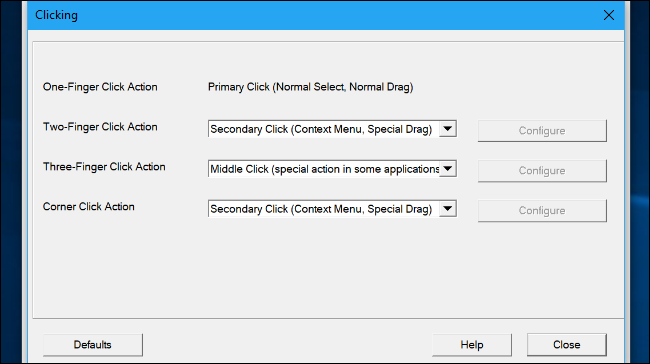 Параметр 'Three-Finger Click Action' установлен на Middle Click
