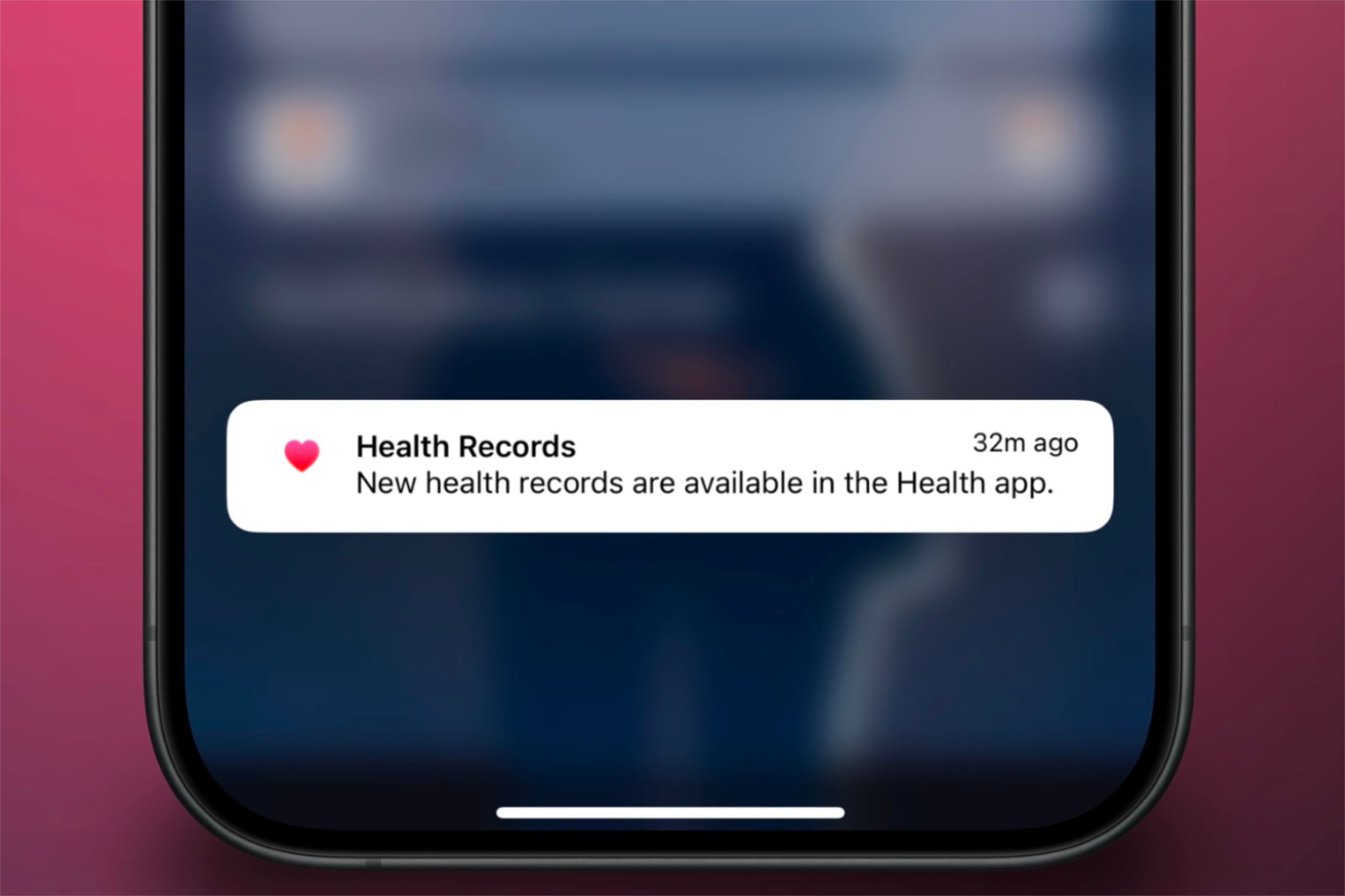 Уведомление из приложения Health о доступных новых записях о здоровье на iPhone с цветным фоном на заднем плане.