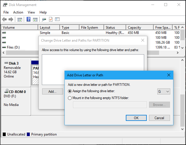 Назначьте любую доступную букву или позволите Windows назначить автоматически.