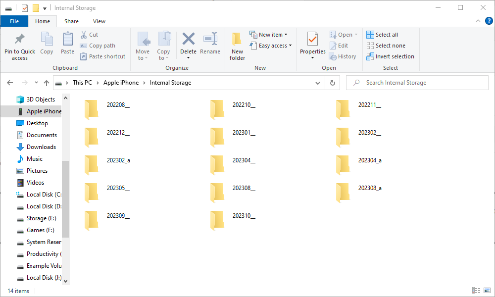 Папки с изображениями на iPhone, отображаемые в Проводнике.