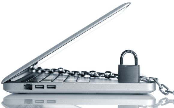 Кабельный замок, прикреплённый к ноутбуку