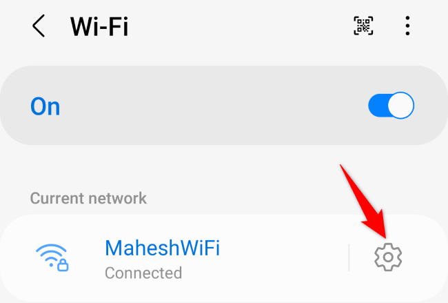 Нажмите значок шестерёнки рядом с текущей Wi‑Fi сетью