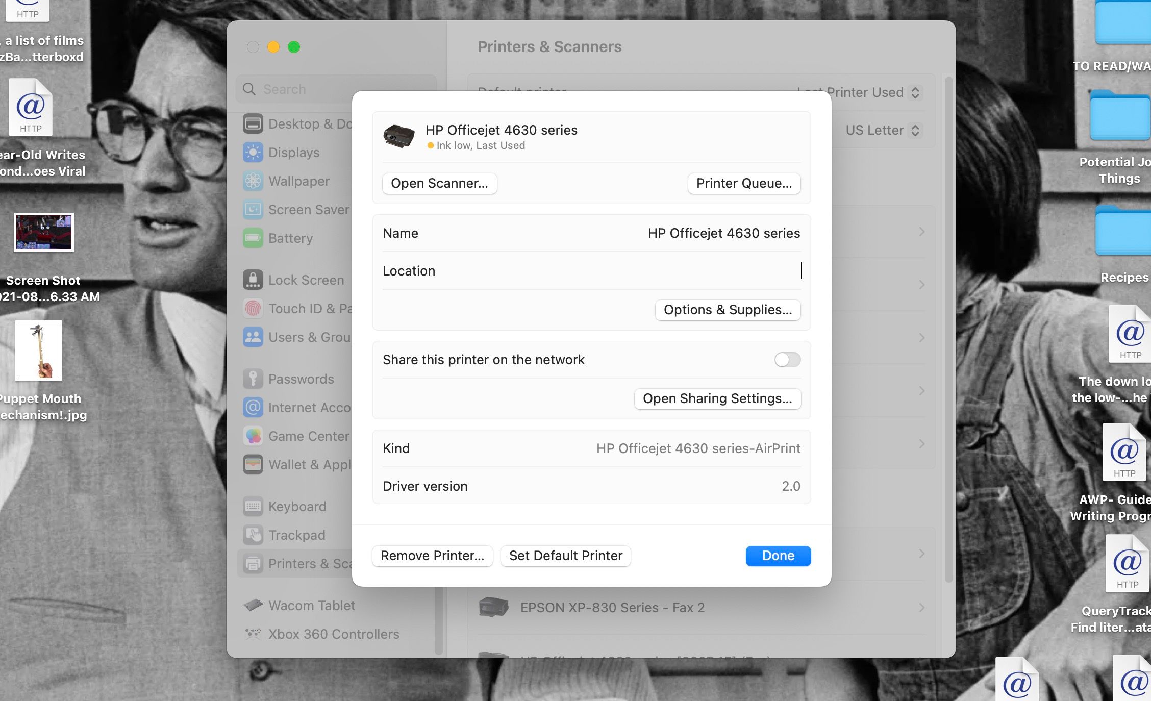 Окно настроек принтера в Системных настройках с выбранным принтером