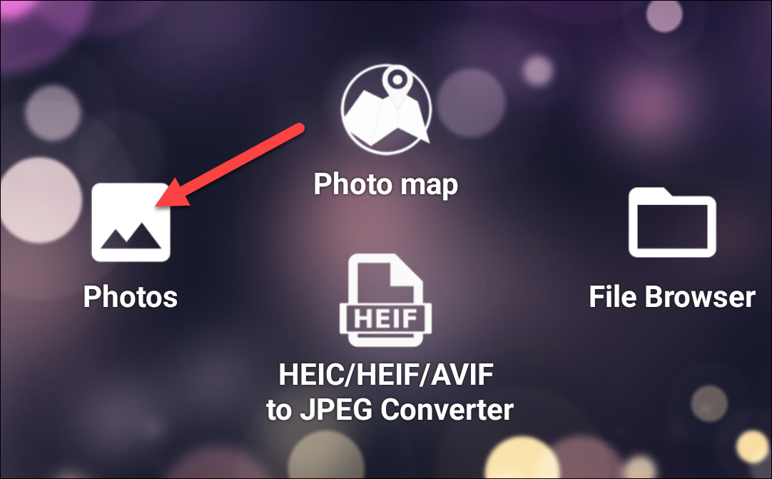 Главный экран Photo EXIF Editor с кнопкой «Photos».